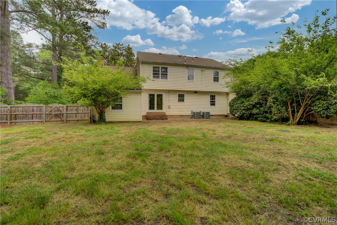 4051 Falstone Road Richmond, VA 23234 - Photo 50 of 50 a view of a house with a big yard