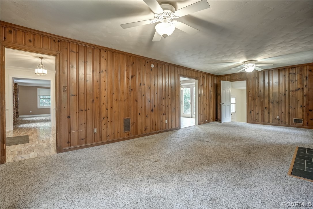 4051 Falstone Road Richmond, VA 23234 - Photo 6 of 50 an empty room with fan and windows