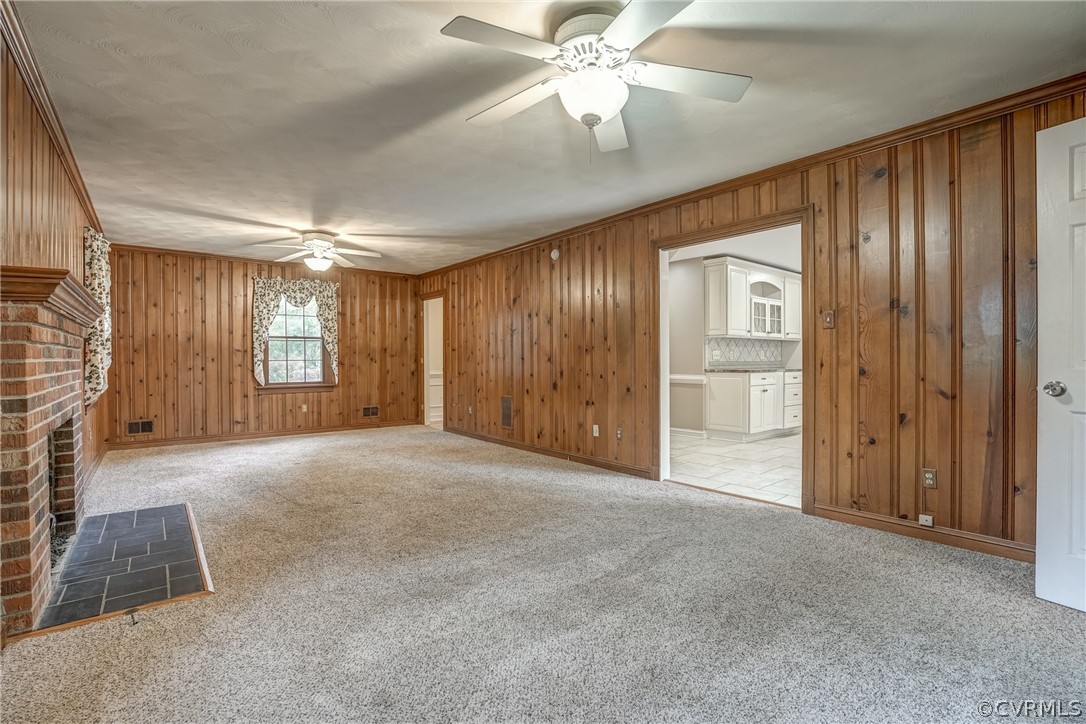 4051 Falstone Road Richmond, VA 23234 - Photo 8 of 50 an empty room with windows and fan
