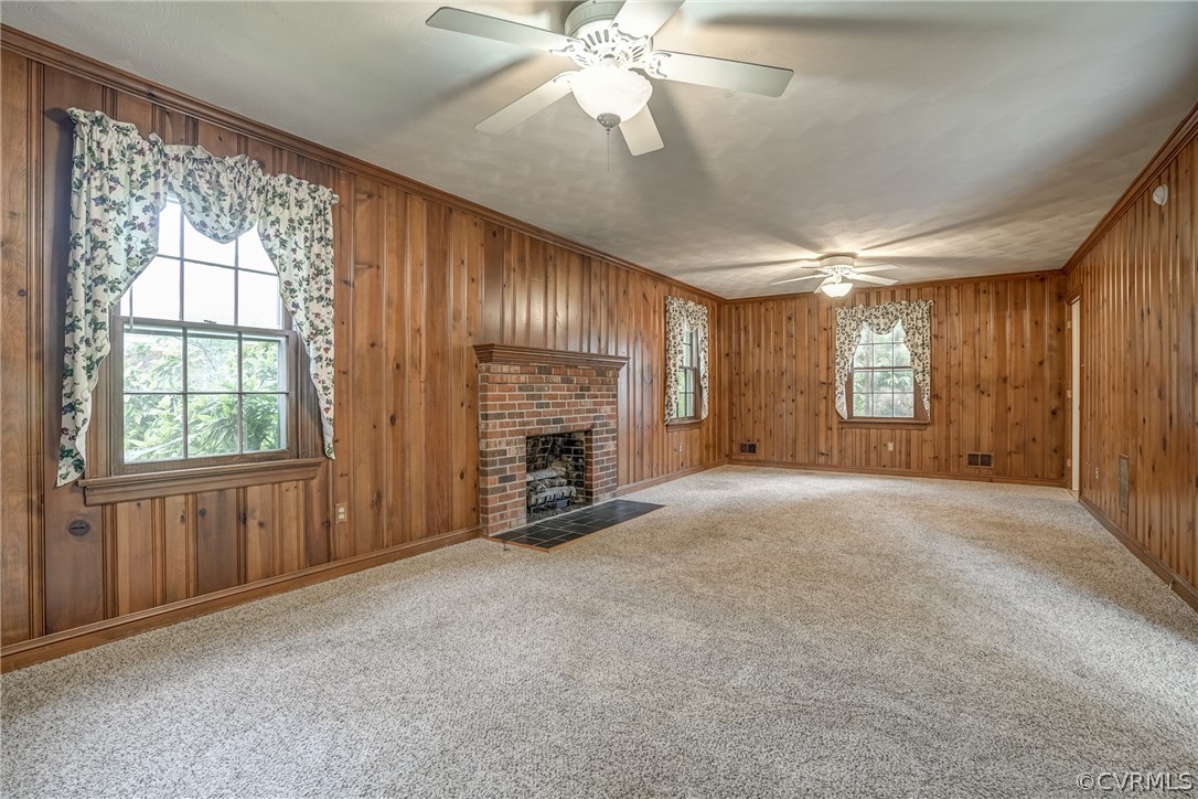 4051 Falstone Road Richmond, VA 23234 - Photo 10 of 50 an empty room with windows and fireplace