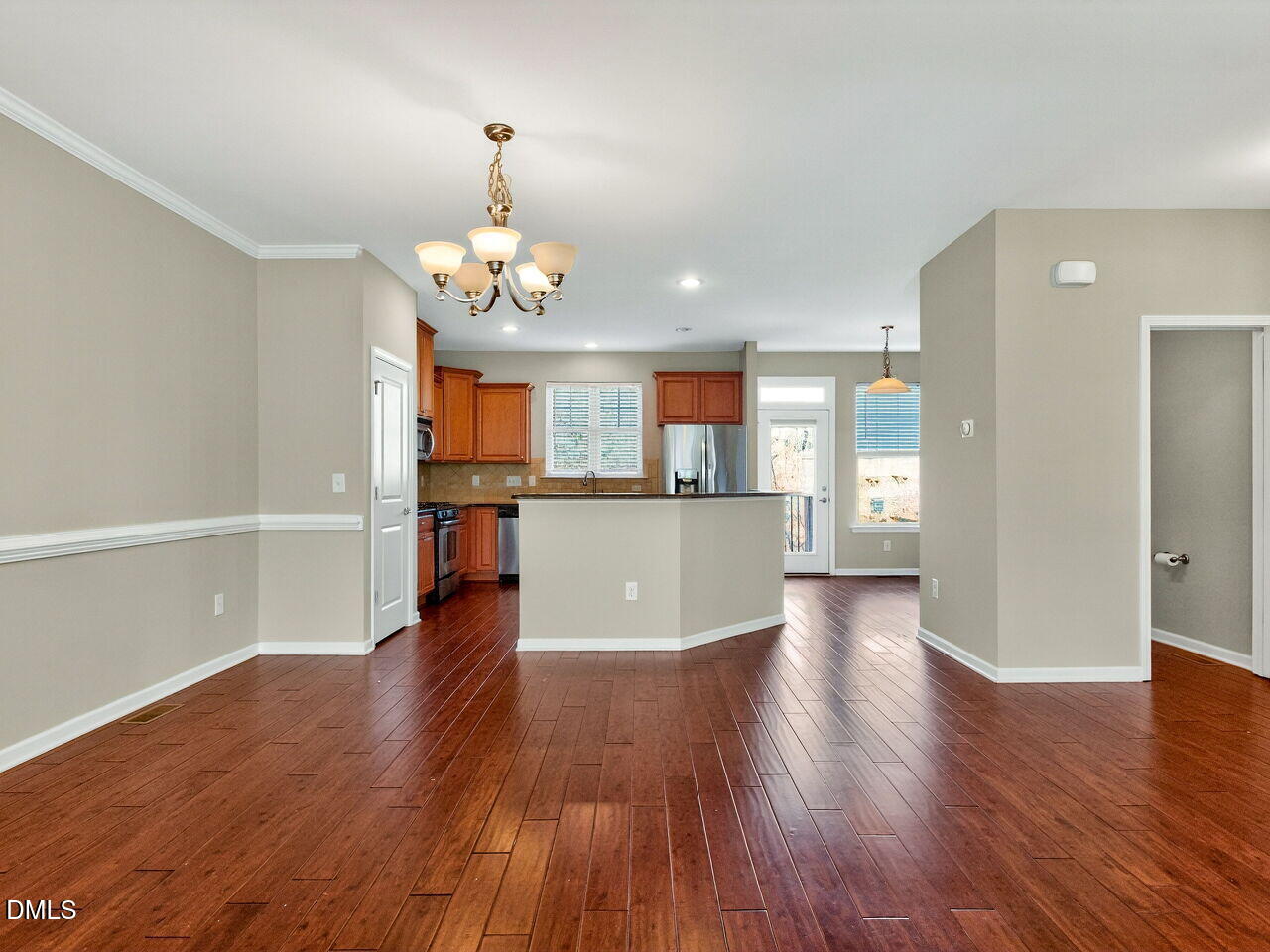 1308 Cornell Place Raleigh, NC 27607 - Photo 11 of 31 a view of a kitchen with wooden floor and a kitchen