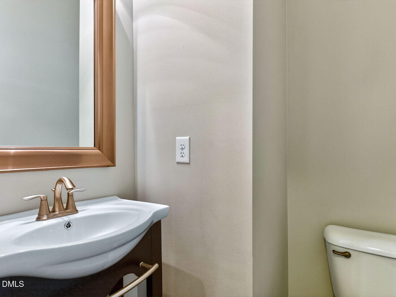 1308 Cornell Place Raleigh, NC 27607 - Photo 12 of 31 a bathroom with a sink and a toilet