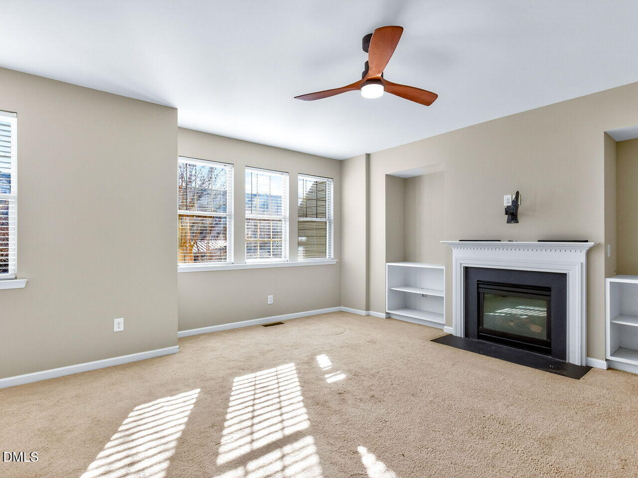1308 Cornell Place Raleigh, NC 27607 - Photo 17 of 31 a living room with furniture and a fireplace