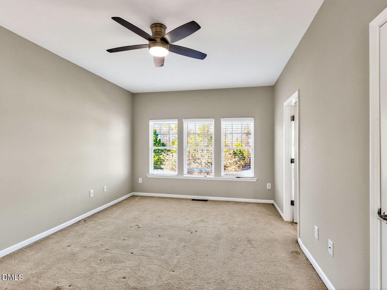 1308 Cornell Place Raleigh, NC 27607 - Photo 19 of 31 a view of an empty room with a window