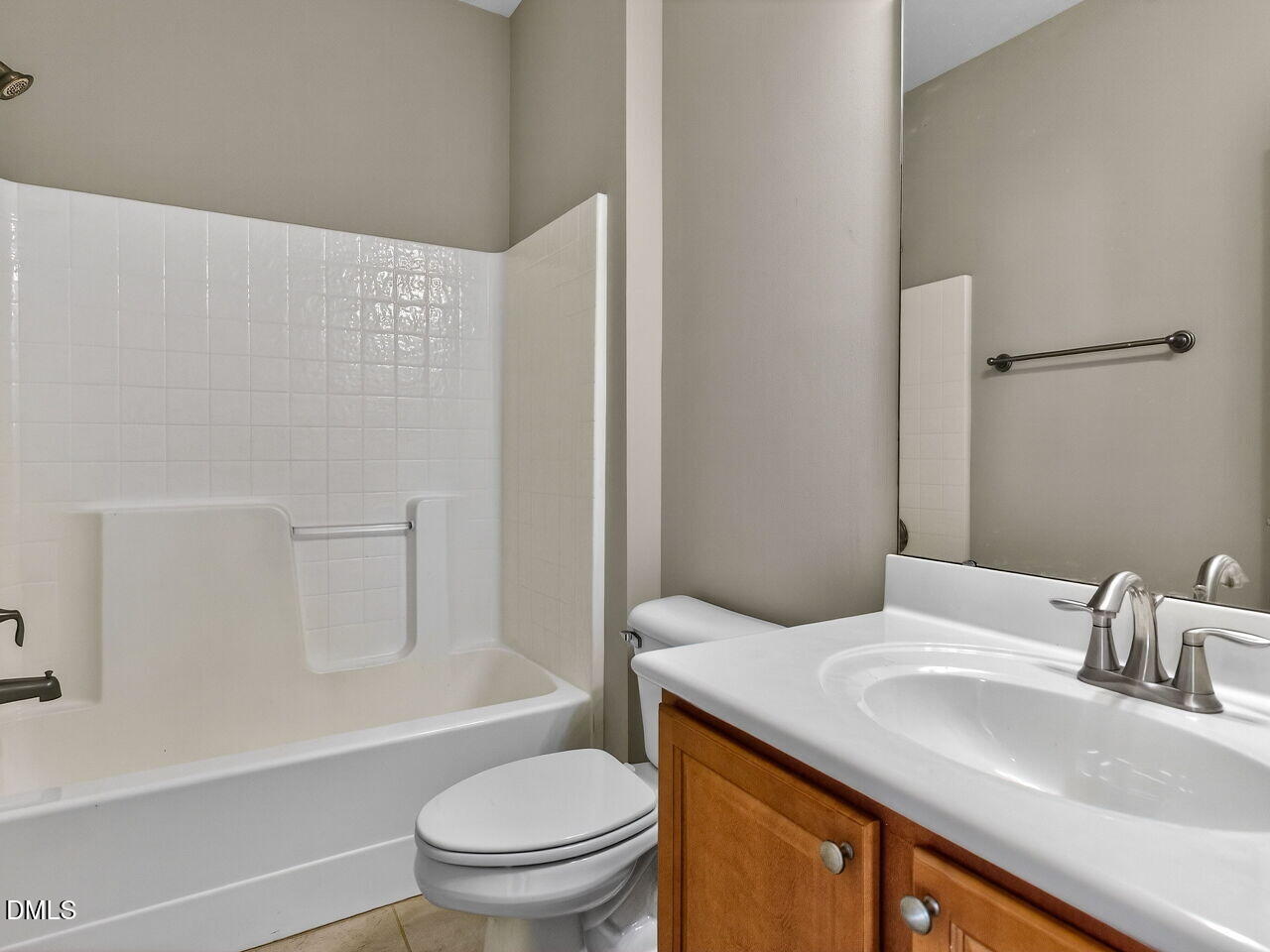 1308 Cornell Place Raleigh, NC 27607 - Photo 26 of 31 a bathroom with a granite countertop sink toilet and shower