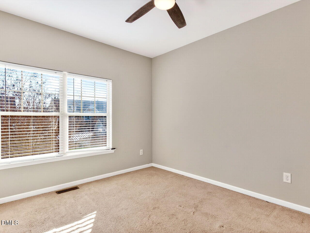 1308 Cornell Place Raleigh, NC 27607 - Photo 28 of 31 an empty room with window