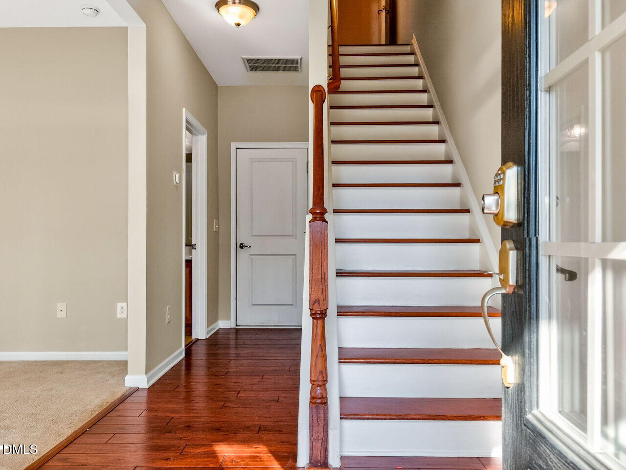 1308 Cornell Place Raleigh, NC 27607 - Photo 5 of 31 a view of an entryway with wooden floor