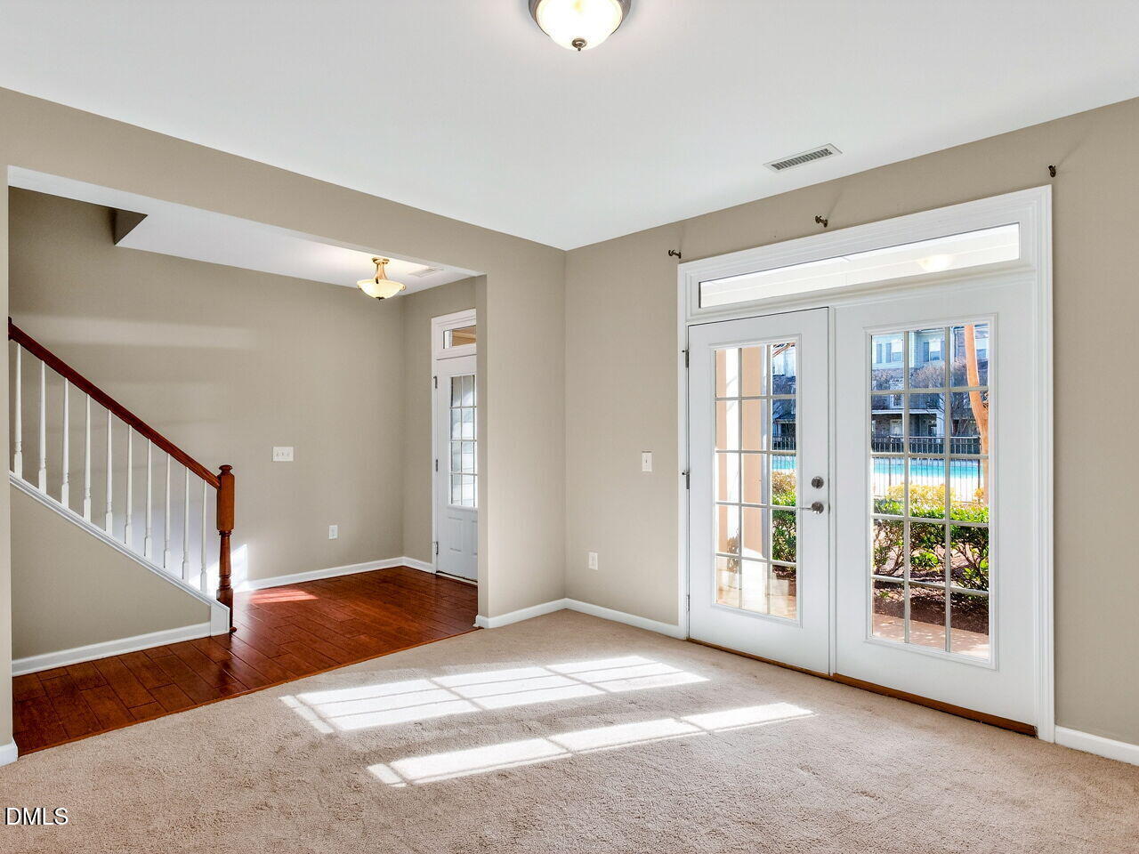 1308 Cornell Place Raleigh, NC 27607 - Photo 7 of 31 a view of an empty room with windows