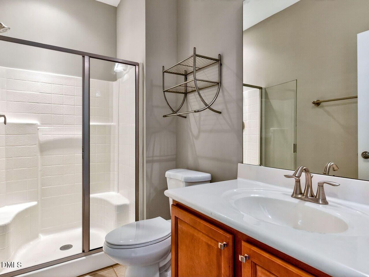 1308 Cornell Place Raleigh, NC 27607 - Photo 8 of 31 a bathroom with a granite countertop sink toilet and shower