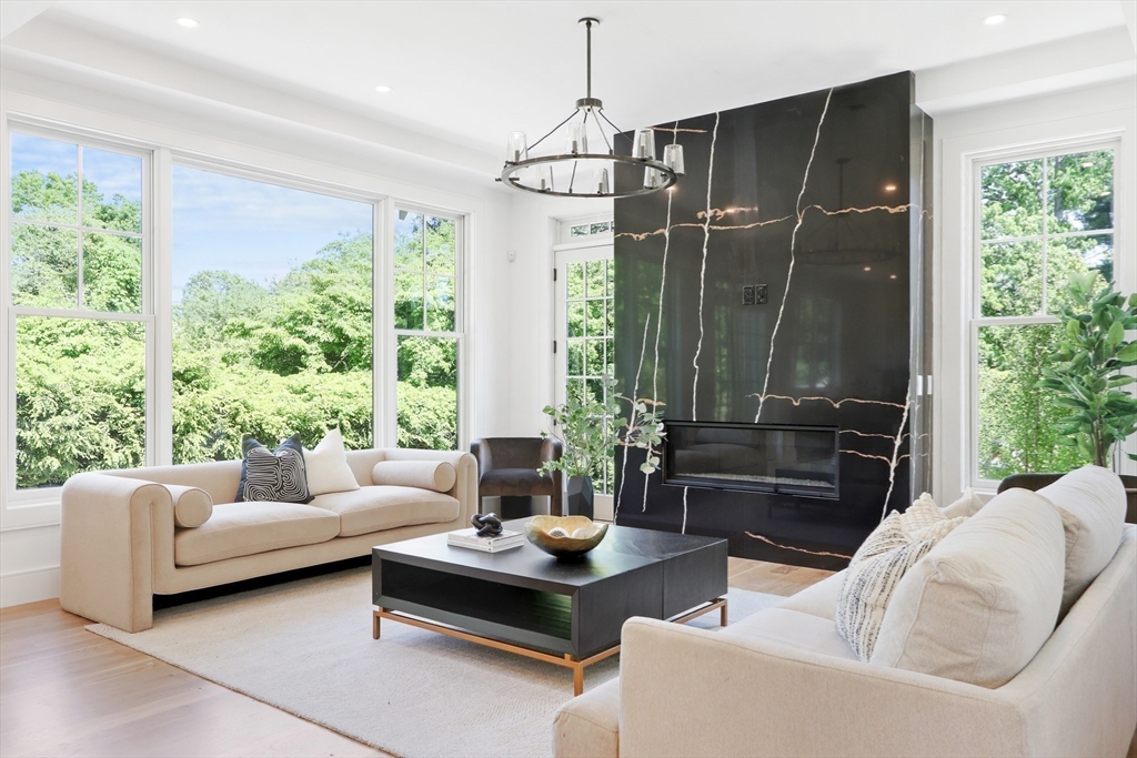 35 Mignon Road Newton, MA 02465 - Photo 12 of 42 a living room with furniture and a large window