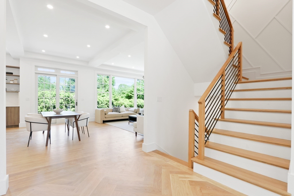 35 Mignon Road Newton, MA 02465 - Photo 18 of 42 a view of entryway and hall with wooden floor