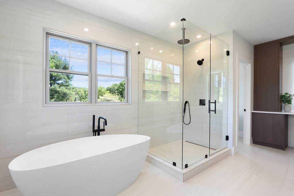 35 Mignon Road Newton, MA 02465 - Photo 25 of 42 a white bath tub sitting next to a shower