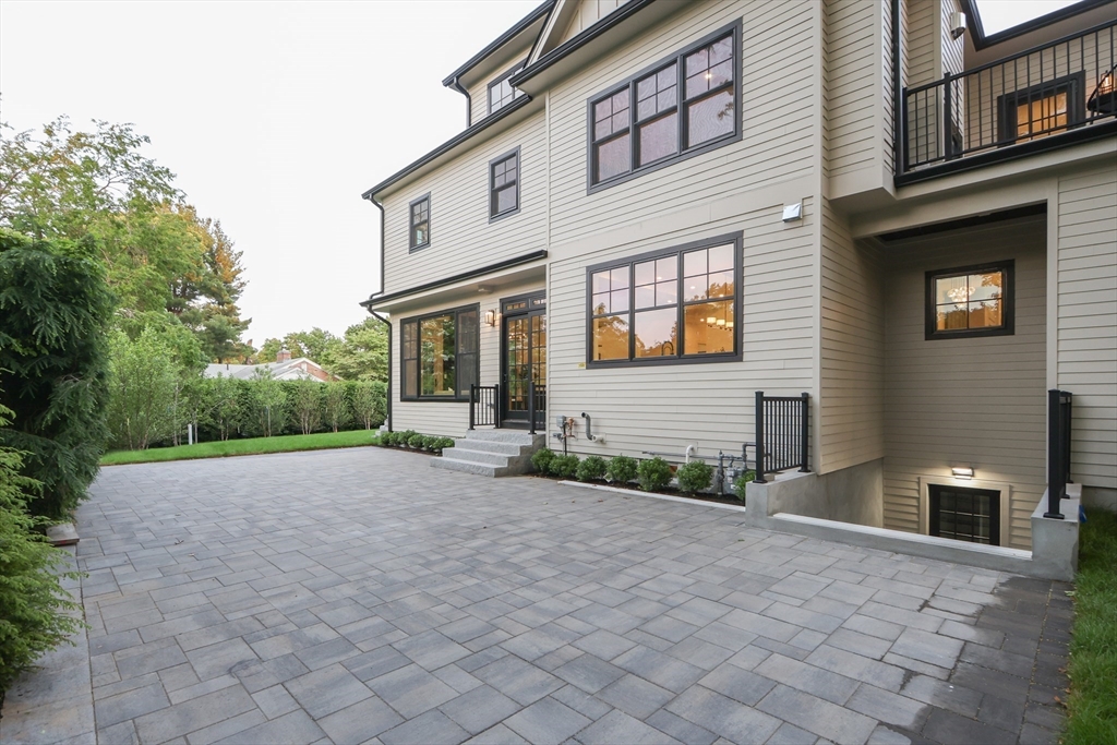 35 Mignon Road Newton, MA 02465 - Photo 3 of 42 a view of a house with backyard and trees
