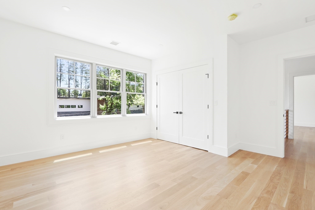 35 Mignon Road Newton, MA 02465 - Photo 31 of 42 a view of an empty room with a window
