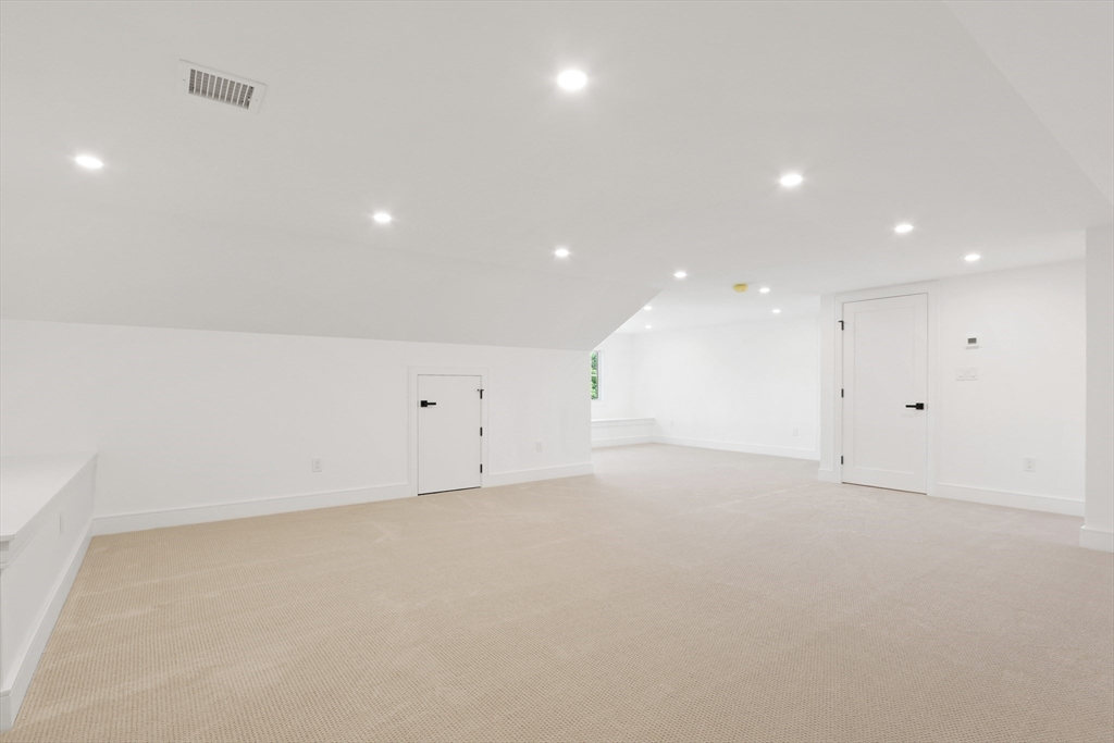 35 Mignon Road Newton, MA 02465 - Photo 35 of 42 an empty room with an entryway