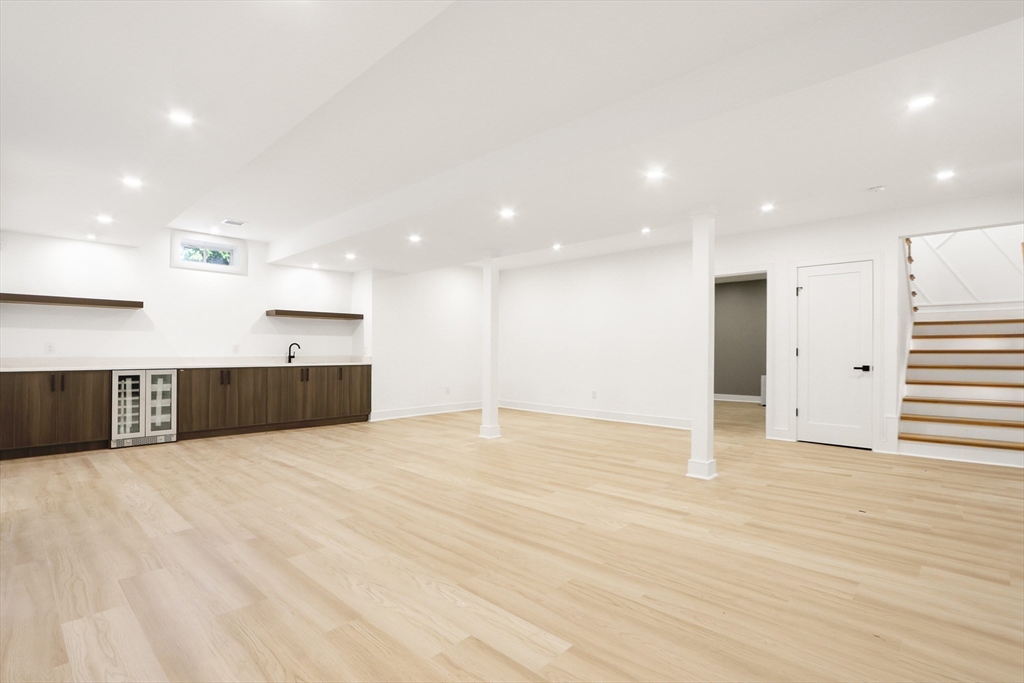 35 Mignon Road Newton, MA 02465 - Photo 37 of 42 a view of an empty room with wooden floor