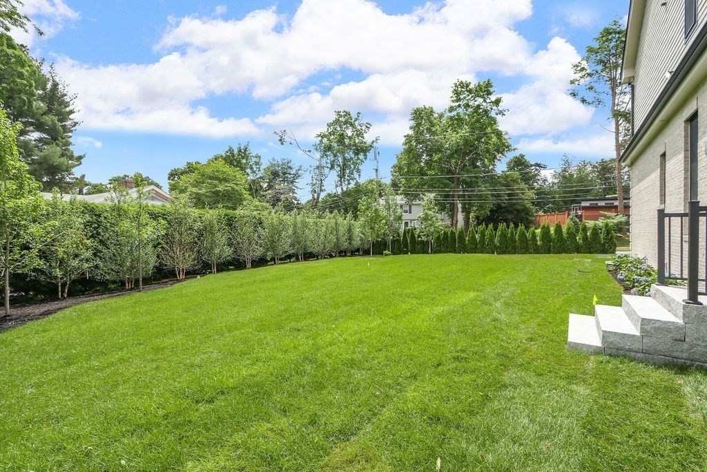 35 Mignon Road Newton, MA 02465 - Photo 38 of 42 a view of a garden with lawn chairs