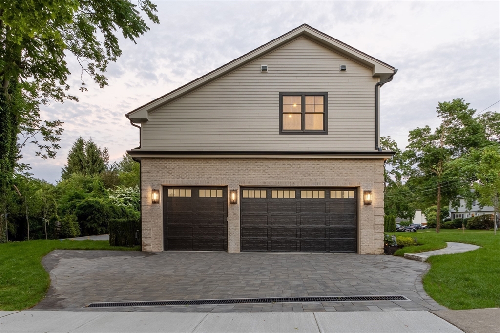 35 Mignon Road Newton, MA 02465 - Photo 40 of 42 a front view of a house with garage
