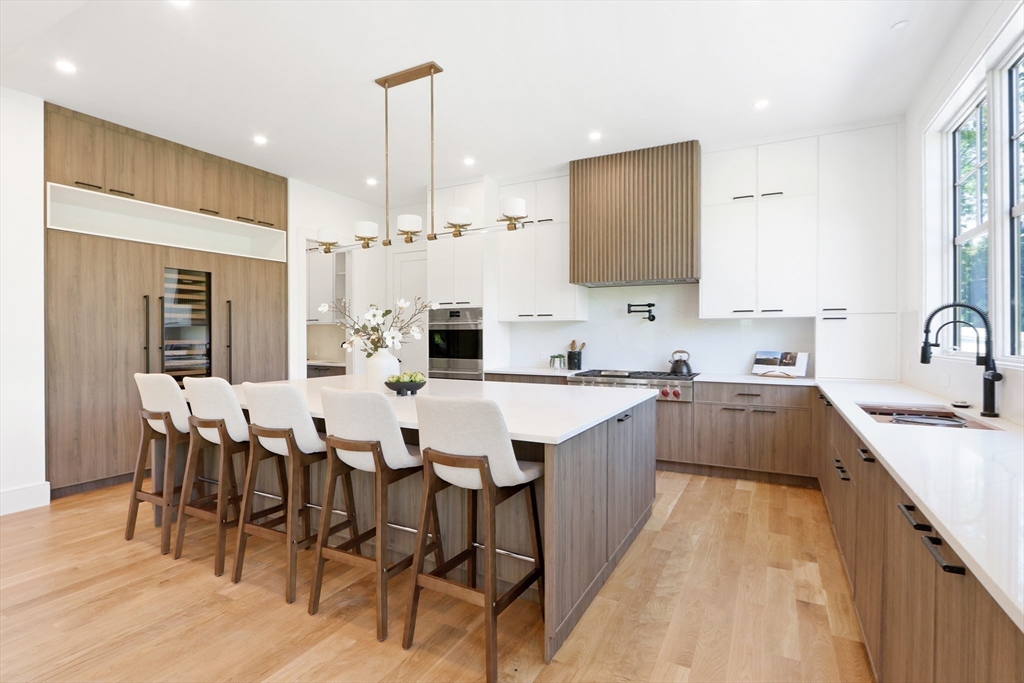35 Mignon Road Newton, MA 02465 - Photo 10 of 42 a large kitchen with lots of counter space and stainless steel appliances