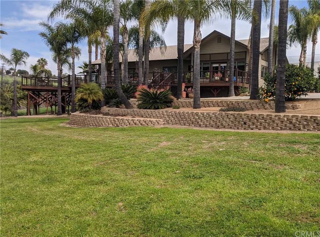 3068 Ridge Creek Drive Fallbrook, CA 92028 - Photo 1 of 1 SPECIAL Mission/Prairie-style home with hints of Frank Lloyd Wright architecture at the end of the Lane with expansive grounds.