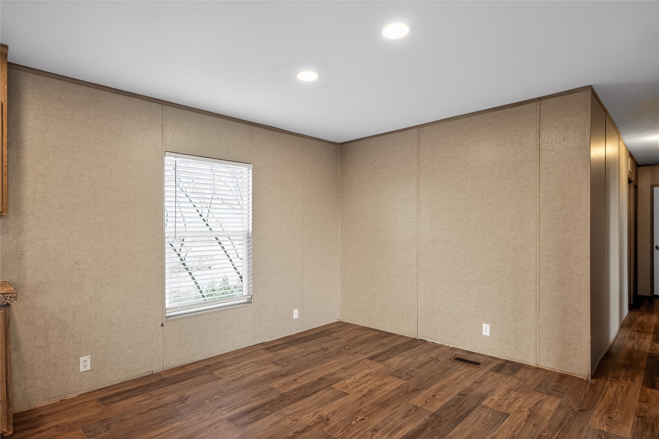 2674 Cotton Gin Road Kyle, TX 78640 - Photo 10 of 30 Spare room featuring dark wood-style flooring and recessed lighting