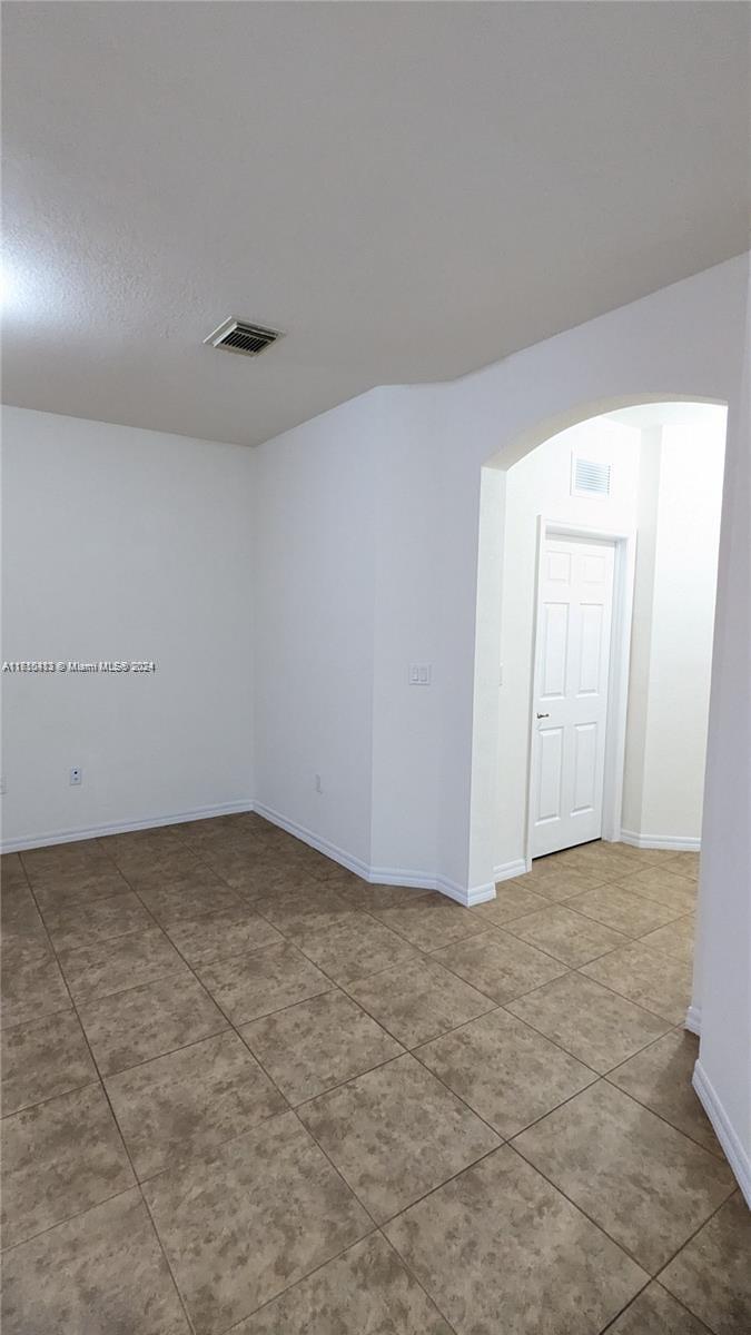 11840 Southwest 154th Avenue, Unit 11840 Miami, FL 33196 - Photo 18 of 61 a view of an empty room