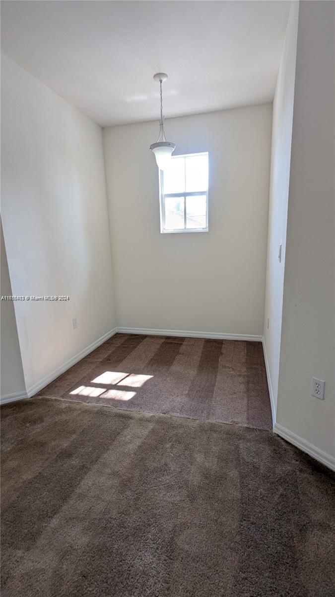11840 Southwest 154th Avenue, Unit 11840 Miami, FL 33196 - Photo 26 of 61 an empty room with windows