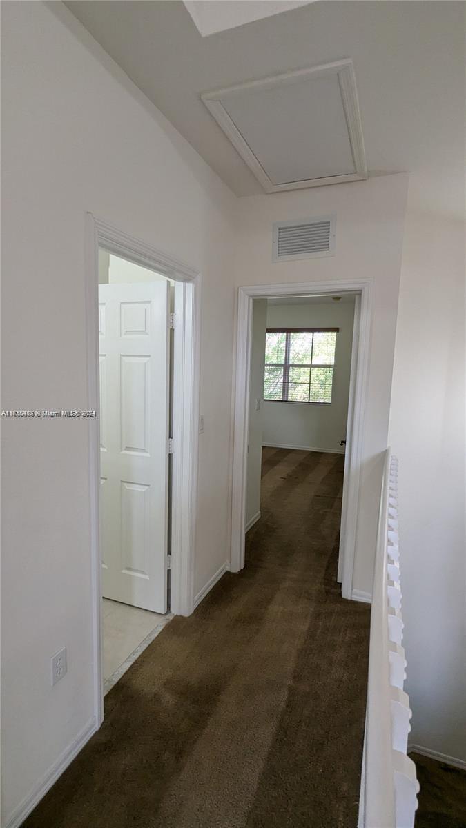 11840 Southwest 154th Avenue, Unit 11840 Miami, FL 33196 - Photo 27 of 61 an empty room with windows