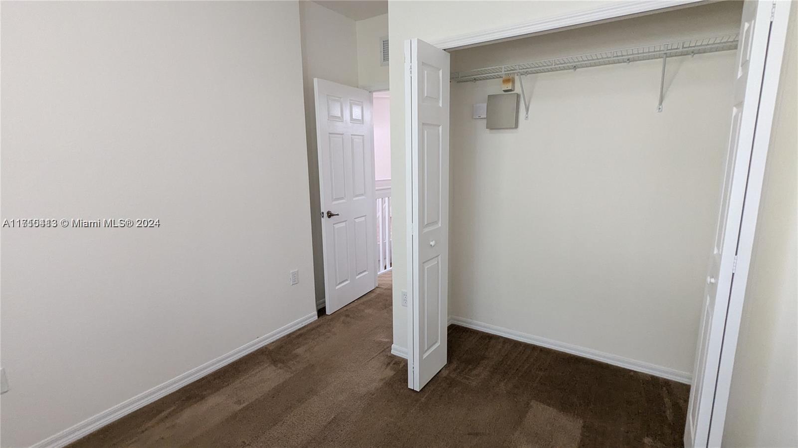 11840 Southwest 154th Avenue, Unit 11840 Miami, FL 33196 - Photo 31 of 61 a view of an empty room