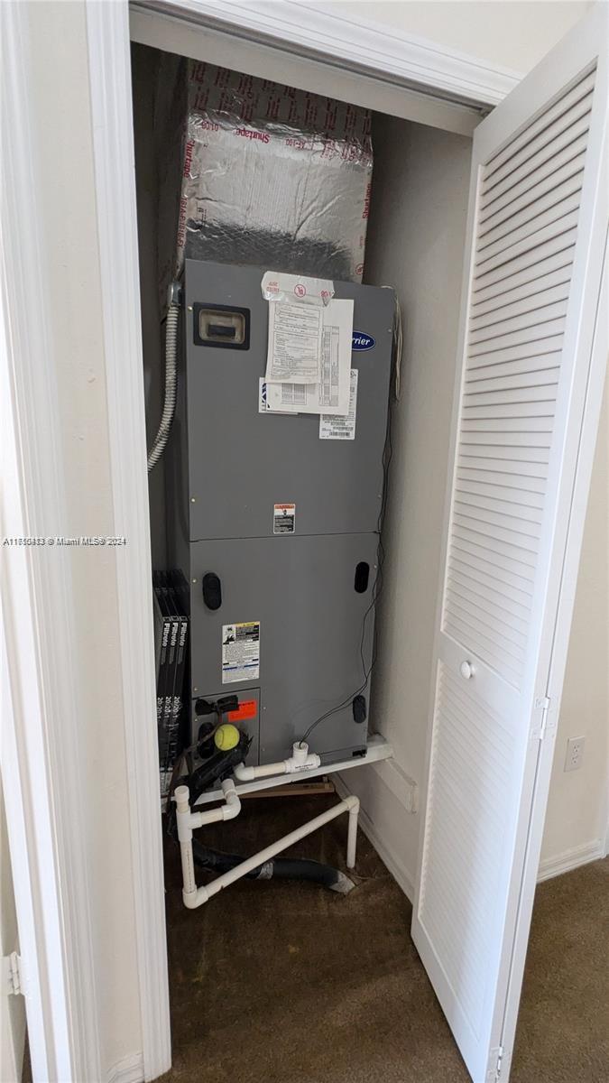 11840 Southwest 154th Avenue, Unit 11840 Miami, FL 33196 - Photo 39 of 61 a room with furniture and window