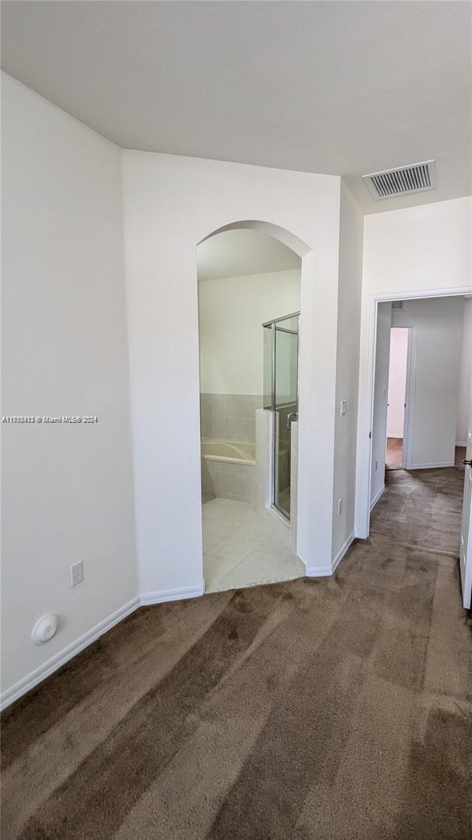 11840 Southwest 154th Avenue, Unit 11840 Miami, FL 33196 - Photo 50 of 61 wooden floor with a bathroom