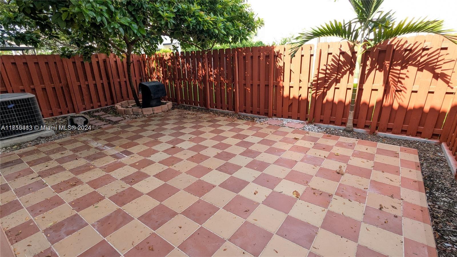 11840 Southwest 154th Avenue, Unit 11840 Miami, FL 33196 - Photo 58 of 61 a view of wooden fence