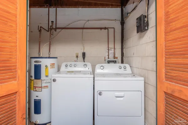 a utility room with dryer and washer