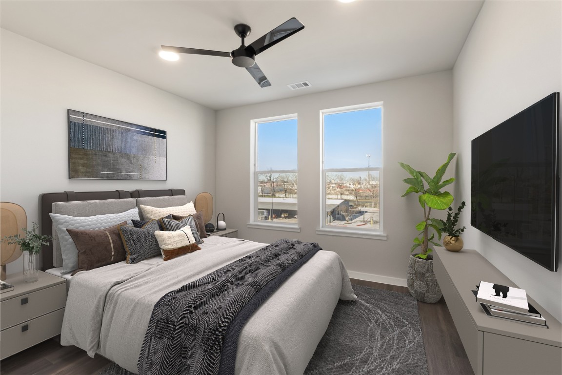 4510 Terry-O Lane, Unit 322 Austin, TX 78745 - Photo 12 of 35 a bedroom with a large bed and a flat screen tv