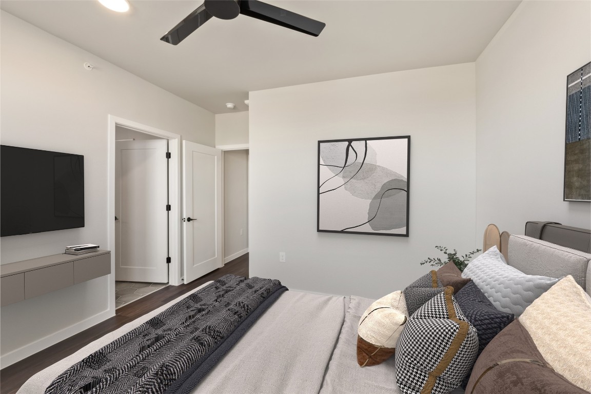 4510 Terry-O Lane, Unit 322 Austin, TX 78745 - Photo 13 of 35 a bedroom with a bed and a television