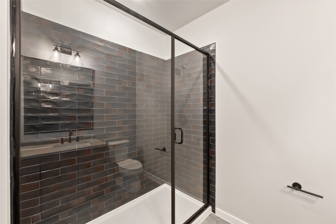 4510 Terry-O Lane, Unit 322 Austin, TX 78745 - Photo 16 of 35 a bathroom with a shower