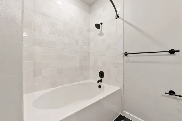 a bathroom with a toilet a sink and a mirror