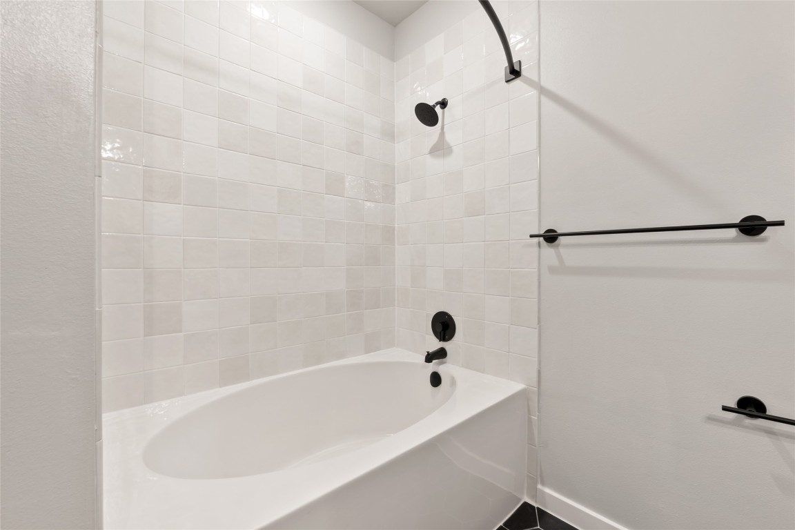 4510 Terry-O Lane, Unit 322 Austin, TX 78745 - Photo 23 of 35 a bathroom with a bathtub