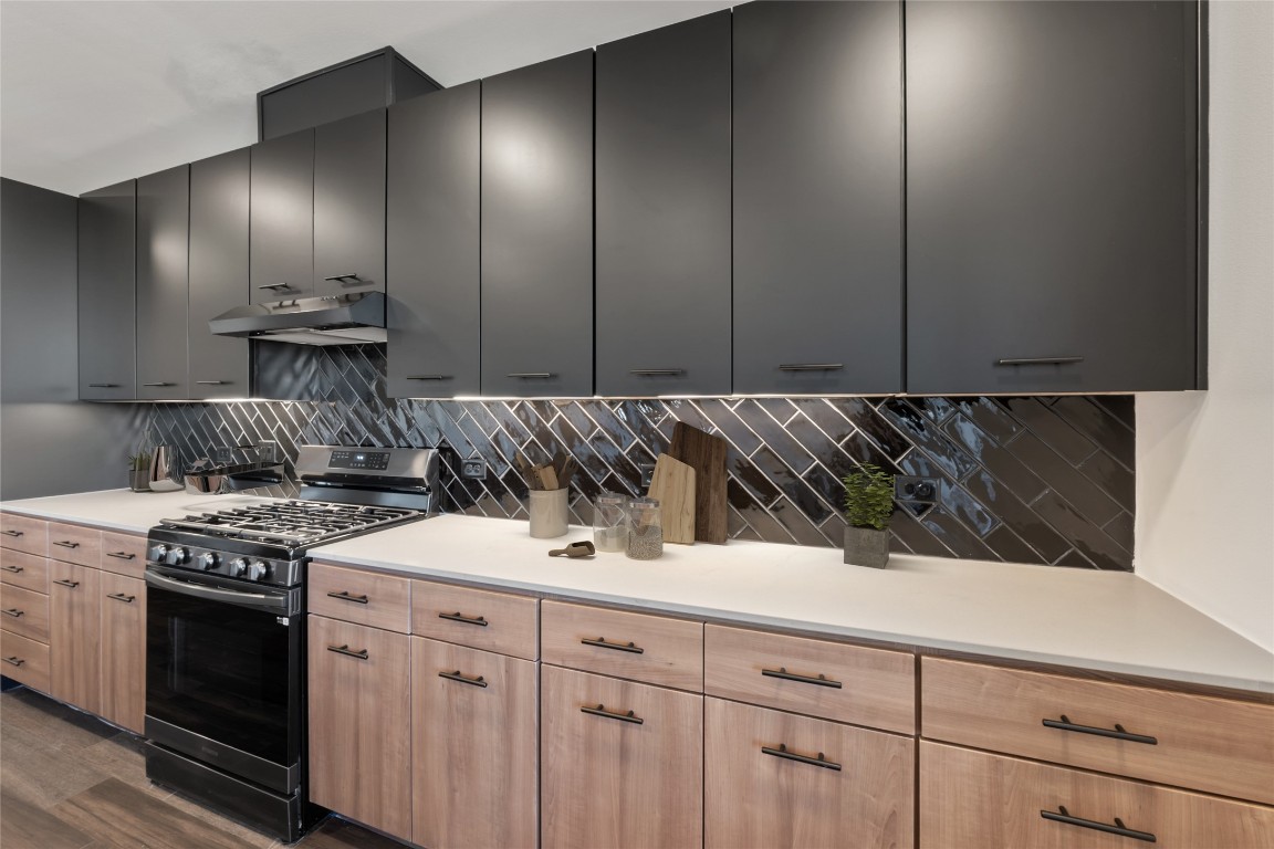 4510 Terry-O Lane, Unit 322 Austin, TX 78745 - Photo 5 of 35 a kitchen with a sink and cabinets