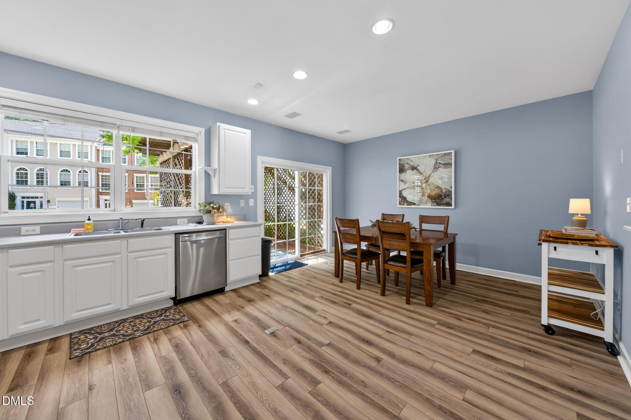 5500 Vista View Court Raleigh, NC 27612 - Photo 13 of 38 a large white kitchen with a large window
