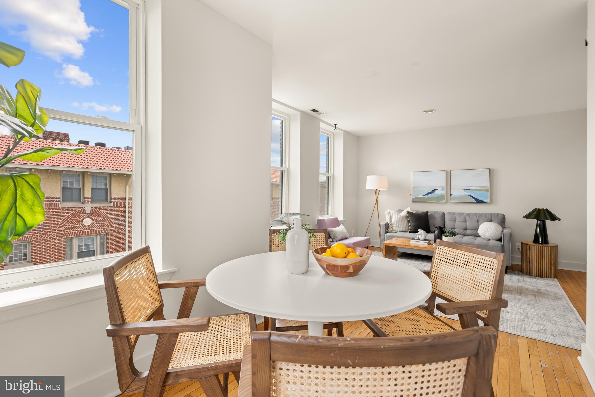 2305 18th Street Northwest, Unit 406 Washington, DC 20009 - Photo 16 of 28 a view of a dining room with furniture and a table and chair