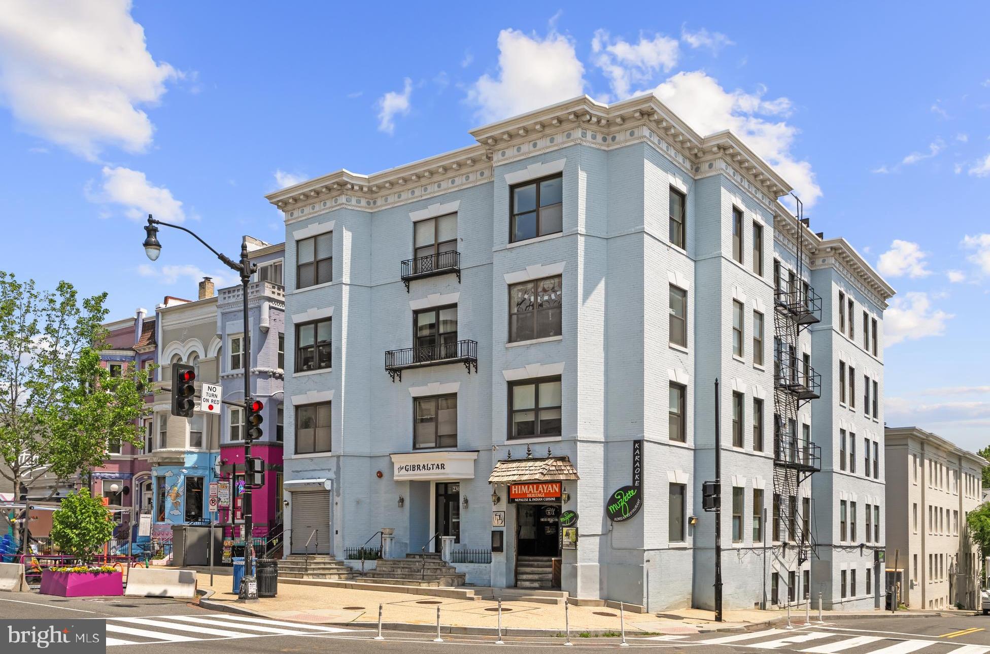2305 18th Street Northwest, Unit 406 Washington, DC 20009 - Photo 17 of 28 a front view of a multi story building