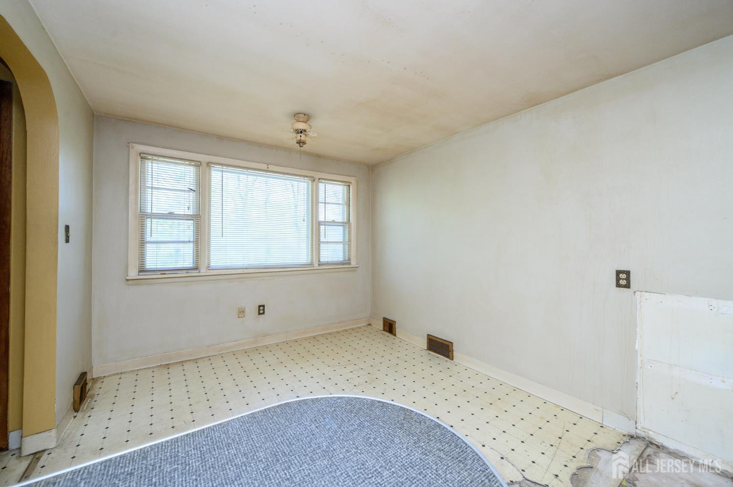 784 Yardville Hamilton Square Road Hamilton, NJ 08691 - Photo 11 of 47 a view of wooden floor and windows in a room