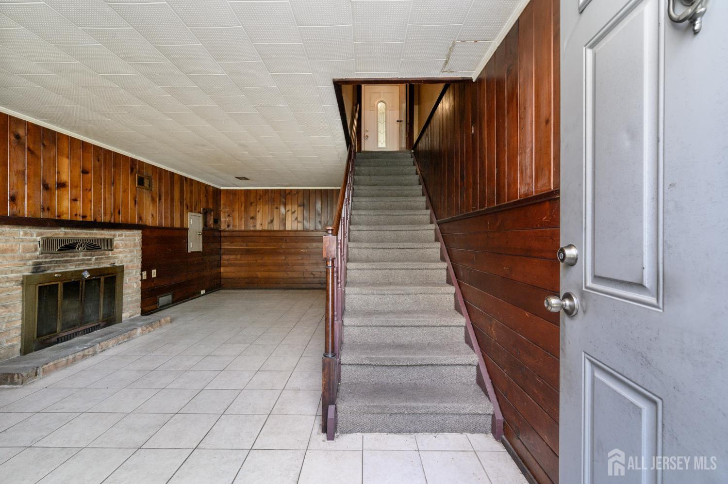 784 Yardville Hamilton Square Road Hamilton, NJ 08691 - Photo 2 of 47 a view of a kitchen with stairs and an empty room