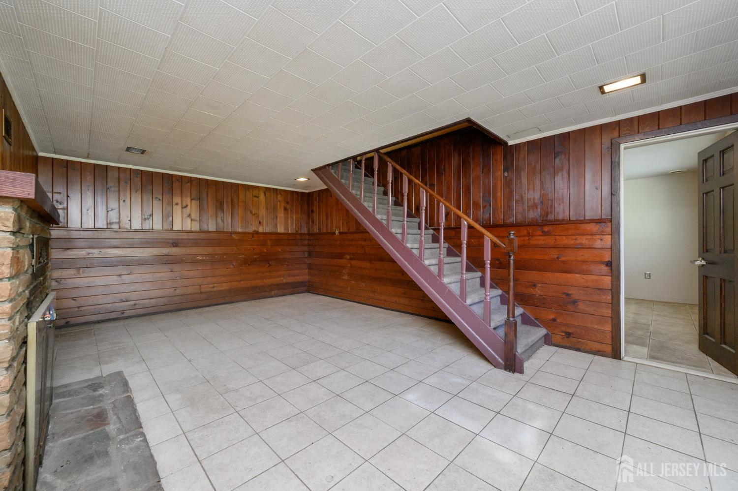 784 Yardville Hamilton Square Road Hamilton, NJ 08691 - Photo 3 of 47 a view of entryway with wooden walls