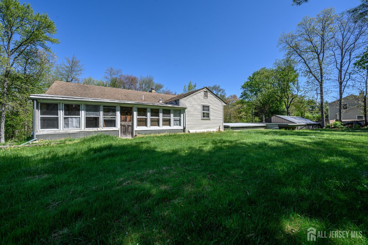 784 Yardville Hamilton Square Road Hamilton, NJ 08691 - Photo 37 of 47 a front view of a house with a garden