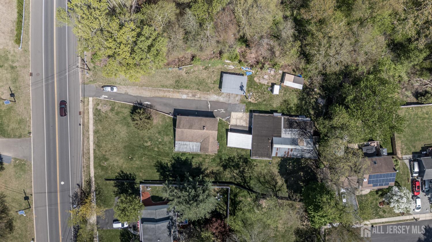 784 Yardville Hamilton Square Road Hamilton, NJ 08691 - Photo 43 of 47 an aerial view of a house with a yard