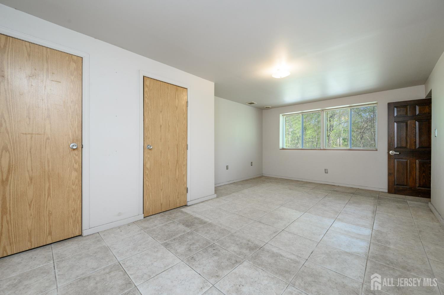784 Yardville Hamilton Square Road Hamilton, NJ 08691 - Photo 7 of 47 a view of an empty room with a window