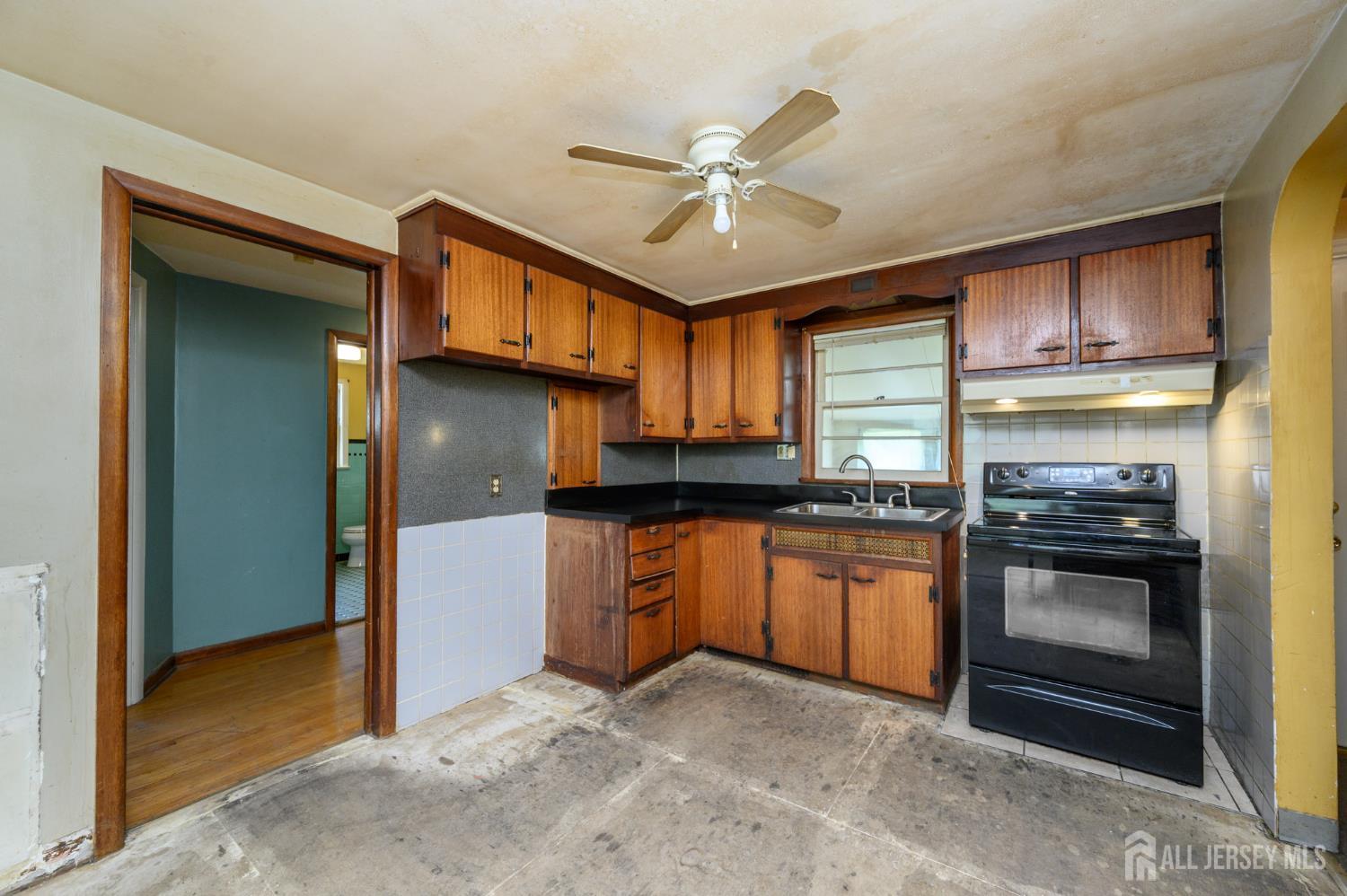 784 Yardville Hamilton Square Road Hamilton, NJ 08691 - Photo 10 of 47 a kitchen with stainless steel appliances granite countertop a refrigerator a stove and a sink