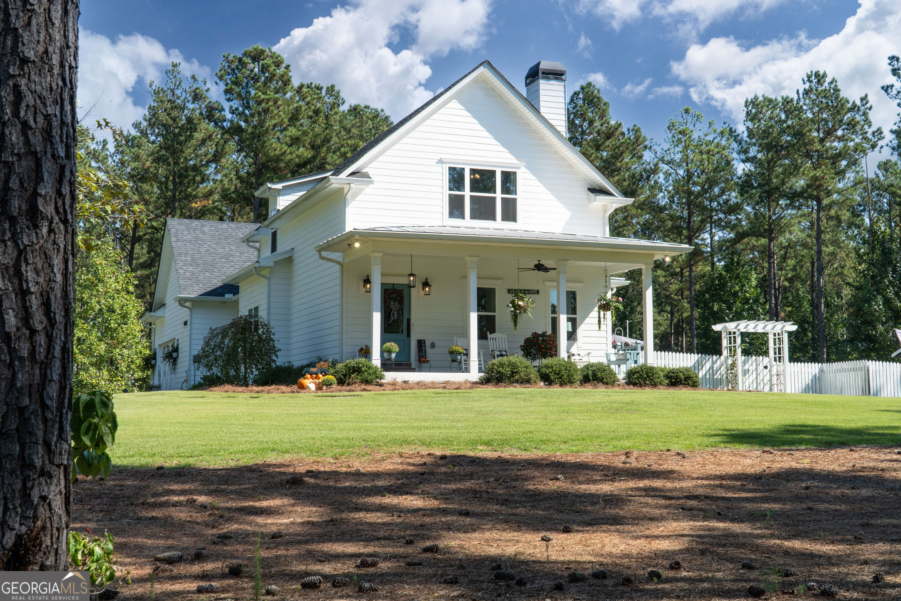 981 Gray Road Roopville, GA 30170 - Photo 1 of 1 a front view of a house with a yard and garage